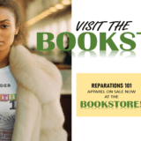 A woman wearing a fur coat and a t shirt with the words visit the bookstore.